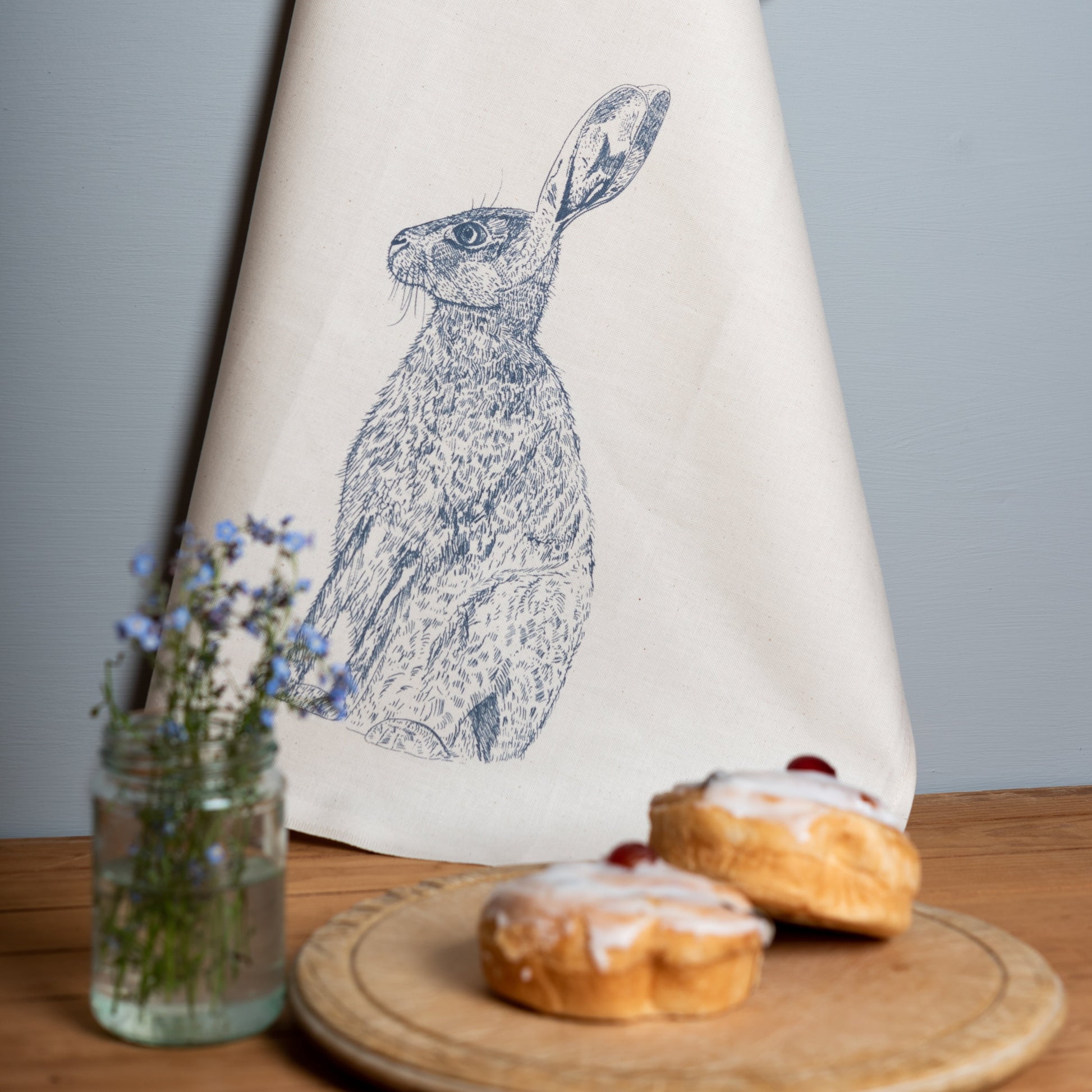 blue hare printed cotton kitchen tea towel